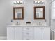 Bright bathroom featuring a double vanity, sleek countertops, and a glass-enclosed walk-in shower at 101 Goldenthal Ct, Cary, NC 27519