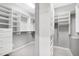Organized walk-in closet with ample shelving and storage options, perfect for keeping things tidy at 101 Goldenthal Ct, Cary, NC 27519