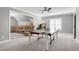 This bonus room with a ping pong table, media area and recessed lights perfect for entertaining at 101 Goldenthal Ct, Cary, NC 27519
