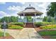 Community gazebo with brick steps, manicured garden, and landscaping at 101 Goldenthal Ct, Cary, NC 27519