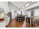 Gourmet eat-in kitchen with vaulted ceilings, custom cabinets, large windows and an island with bar seating at 101 Goldenthal Ct, Cary, NC 27519