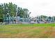 Expansive community playground with multiple slides and play structures, providing endless entertainment at 101 Goldenthal Ct, Cary, NC 27519