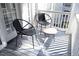 Cozy balcony featuring outdoor seating, perfect for relaxing and enjoying the sunshine at 1023 Kelton Cottage Way, Morrisville, NC 27560