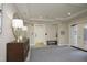 Lobby area featuring stylish decor, a console table and carpeting at 1023 Kelton Cottage Way, Morrisville, NC 27560