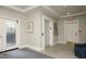 Lobby area featuring stylish decor, access to an elevator, and carpeting at 1023 Kelton Cottage Way, Morrisville, NC 27560