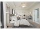 Spacious main bedroom with a tray ceiling, ceiling fan, and neutral décor at 1023 Kelton Cottage Way, Morrisville, NC 27560