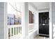 Charming condo balcony with view of the building's exterior at 1081 Wirewood Dr # 302, Raleigh, NC 27605