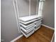 Walk in Closet with custom shelves and drawers at 1081 Wirewood Dr # 302, Raleigh, NC 27605