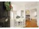 Inviting entryway with a holiday wreath and elegant console table at 1081 Wirewood Dr # 302, Raleigh, NC 27605