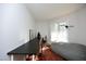 Bright office space with sleek black desk, gray beanbag chair and natural light at 1081 Wirewood Dr # 302, Raleigh, NC 27605
