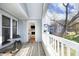 Cozy porch featuring a small table and chairs at 1081 Wirewood Dr # 302, Raleigh, NC 27605