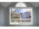 Picturesque porch view of the community landscaping and architecture at 1081 Wirewood Dr # 302, Raleigh, NC 27605