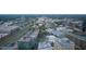 Expansive aerial view of the city with a mix of buildings, trees, and infrastructure on a bright day at 110 N Corcoran St # 2502, Durham, NC 27701