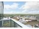 Stunning city view from a balcony, featuring cityscape, train tracks, and blue skies at 110 N Corcoran St # 2502, Durham, NC 27701