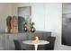An artistic nook showcasing modern decor, a Buddha statue, and contemporary artwork at 110 N Corcoran St # 2502, Durham, NC 27701