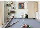 Beautifully staged game room with a pool table, artwork, shelving and modern decor at 110 N Corcoran St # 2502, Durham, NC 27701