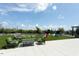 Inviting outdoor lounge featuring comfortable seating, manicured landscaping, and open sky at 110 N Corcoran St # 2502, Durham, NC 27701