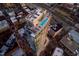 Aerial view showcasing the rooftop pool and lounge area of a luxury high-rise building at 110 N Corcoran St # 2502, Durham, NC 27701