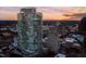 Skyscrapers tower in the sunset skyline, presenting modern architecture against a colorful sky at 110 N Corcoran St # 2502, Durham, NC 27701