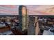 Skyscrapers tower in the evening skyline, presenting modern architecture against a colorful sky at 110 N Corcoran St # 2502, Durham, NC 27701