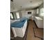 Well-lit kitchen with a large island and stainless steel appliances at 1101 Brookrun Dr, Oxford, NC 27565