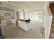Bright, spacious kitchen with white cabinetry and open layout under construction at 1101 Brookrun Dr, Oxford, NC 27565