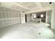 Large, unfinished living room with bright natural light and an open floor plan at 1101 Brookrun Dr, Oxford, NC 27565