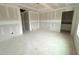 Spacious living room featuring open floor plan and electrical wiring in progress at 1101 Brookrun Dr, Oxford, NC 27565