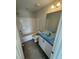 Bathroom featuring a shower-tub combo and vanity covered in protective wrap, awaiting your personal touch at 1102 Brookrun Dr, Oxford, NC 27565