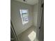 Empty walk-in closet with a window offering natural light and a sense of spaciousness for easy organization at 1102 Brookrun Dr, Oxford, NC 27565