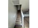 Stairway leading to upper level, connecting to the kitchen and common areas, promoting a seamless flow at 1102 Brookrun Dr, Oxford, NC 27565