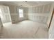 New bedroom shows a bright space with natural light, ready for your decor at 1102 Brookrun Dr, Oxford, NC 27565