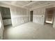 New construction bedroom features unfinished drywall and bare floor at 1103 Brookrun Dr, Oxford, NC 27565