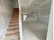 New construction living room shows unfinished drywall and bare floor at 1103 Brookrun Dr, Oxford, NC 27565