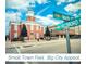 A small town feel with big city appeal shown by building facades and street sign at 1103 Brookrun Dr, Oxford, NC 27565