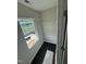 Walk-in closet with rod and shelf with view of neighborhood at 1104 Brookrun Dr, Oxford, NC 27565