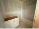 Unfinished bathroom with white tub and cabinet base, offering a blank canvas for a personalized design at 1104 Brookrun Dr, Oxford, NC 27565