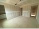 Unfinished room showcasing drywall, electrical outlets, and potential for future design and customization at 1104 Brookrun Dr, Oxford, NC 27565