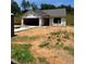 Image of home under construction showing framing, and the garage on a sunny day at 12 Crow Field St, Roxboro, NC 27574