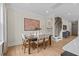 Cozy dining room with stylish decor and plenty of natural light, next to staircase at 1259 Hammond Dr, Mebane, NC 27302