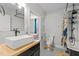 Stylishly renovated bathroom featuring a modern vanity, classic fixtures and clawfoot tub at 1310 S 8Th St, Lillington, NC 27546