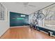 Bonus room featuring hardwood floors, natural light, an accent wall and space to store bicycles at 1310 S 8Th St, Lillington, NC 27546