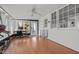Versatile bonus room with hardwood floors, a workstation, and lots of natural light from multiple windows at 1310 S 8Th St, Lillington, NC 27546