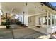 Covered carport offering protection from the elements with access to the main house and backyard at 1310 S 8Th St, Lillington, NC 27546
