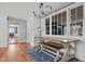 Charming dining room with hardwood floors, a statement chandelier, and lots of natural light at 1310 S 8Th St, Lillington, NC 27546