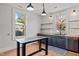 Bright kitchen features ample natural light, wood countertops, and stainless steel appliances at 1310 S 8Th St, Lillington, NC 27546