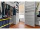 Spacious walk-in closet with built-in shelving, storage drawers and natural light at 1310 S 8Th St, Lillington, NC 27546