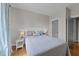 Bedroom showcases hardwood floors, a comfortable bed, and a neutral color palette at 1515 E Jones St, Raleigh, NC 27610