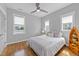 Bright bedroom with hardwood floors, natural light, and a boat shelf at 1515 E Jones St, Raleigh, NC 27610