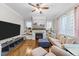 Bright living room with fireplace, built-ins, and neutral decor, showcasing a welcoming space at 1515 E Jones St, Raleigh, NC 27610